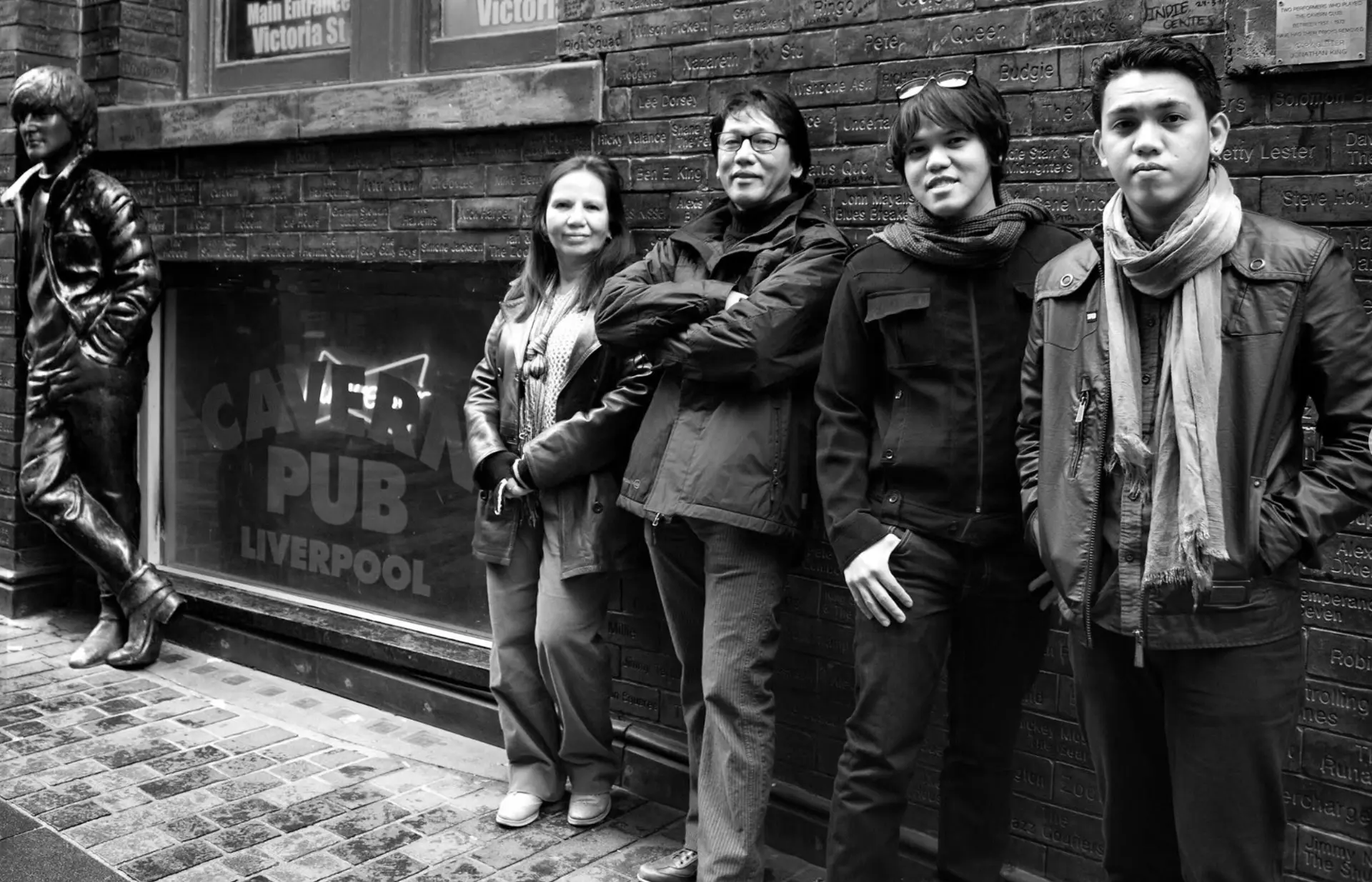 Resty Garcia with fellow musicians outside the Cavern Pub in Liverpool during an international tour